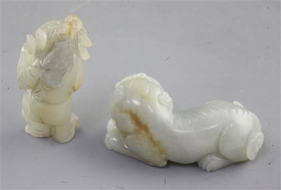 Two Chinese pale celadon jade figures of Liu Hai and his three legged toad and a recumbent lion-dog, 19th/20th century, length 6.6cm